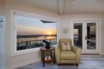 Watch sunsets from virtually any room in this home